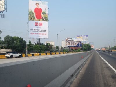Jl. Tol JKT TGR pada Km 9+875 ( Uniqlo )